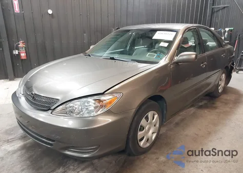 2002 Toyota Camry Le z USA, uszkodzony, nr VIN 4T1BE32K32U528231